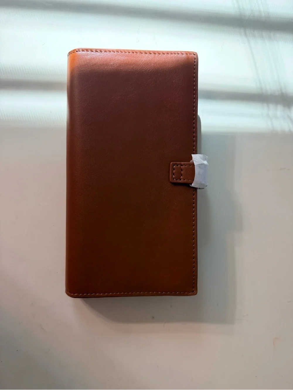 Portland Leather vintage Tan Leather Long Wallet with Gold-Tone H Closure.